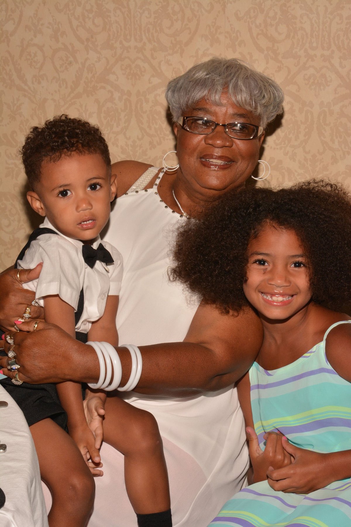 Grandma surrounded by her grandkids
